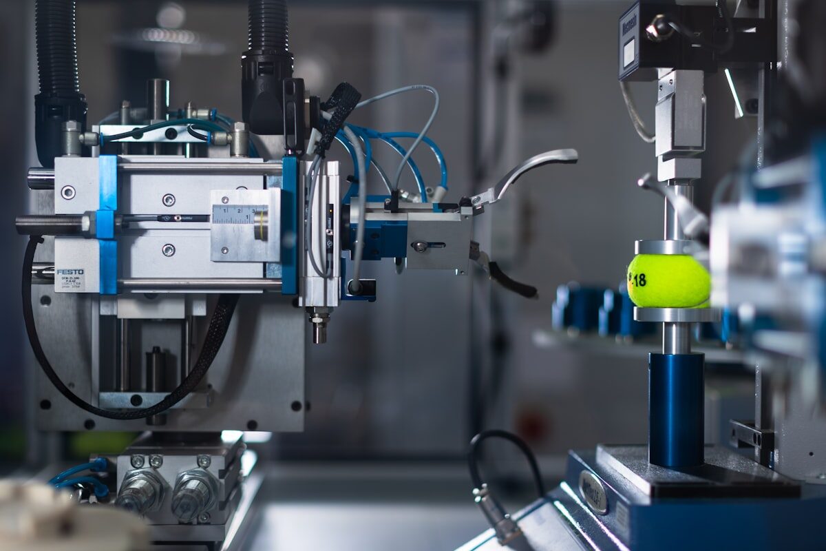 Blue and silver precision industrial dispensing machine for Litemask™ UV maskant dam-and-fill mould cavity masking